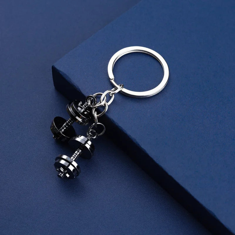 Neuer Mini Metall Hantelschlüsselanhänger für Männer Doppel-Hanteln Fitnessstudio Mobile Rucksack Hängende Accessoires Schlüsselanhänger Partygeschenk